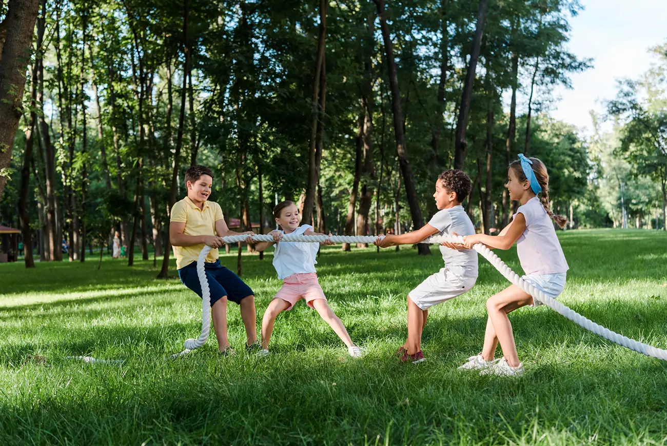 Kids playing tug of war.