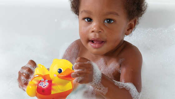 baby-in-bath-with-bath-toy