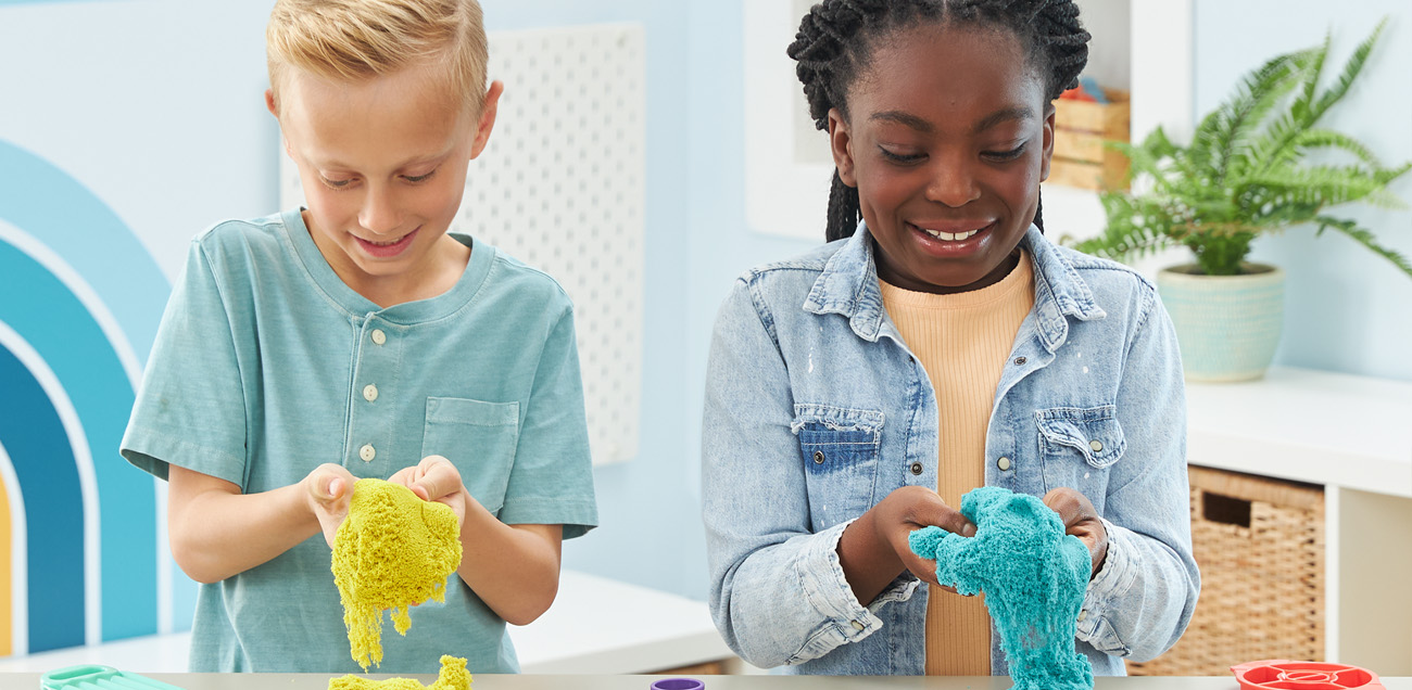 Children playing with kinetic sand