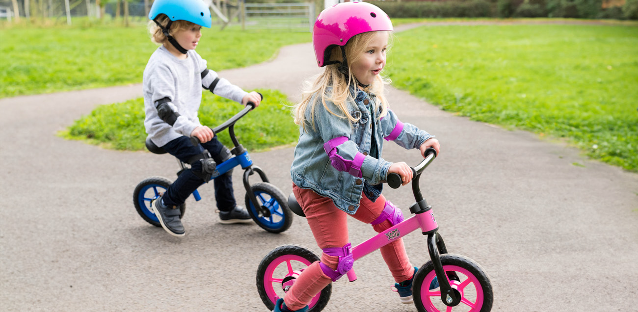 Children riding bikes in the park