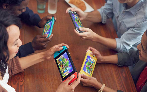 Family playing Nintendo Switch