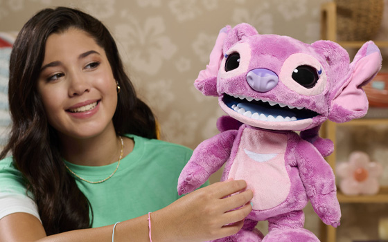 Girl Playing With Interactive Stitch Toy