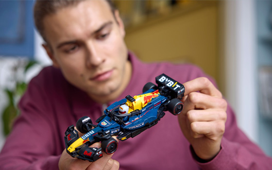 Adult building a LEGO set