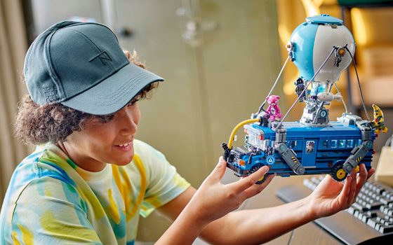 Boy building a LEGO Fortnite set