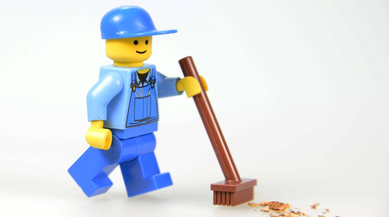 Lego man sweeping