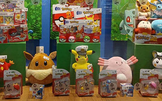 Shop window showing a selection of Pokemon toys sold at The Entertainer
