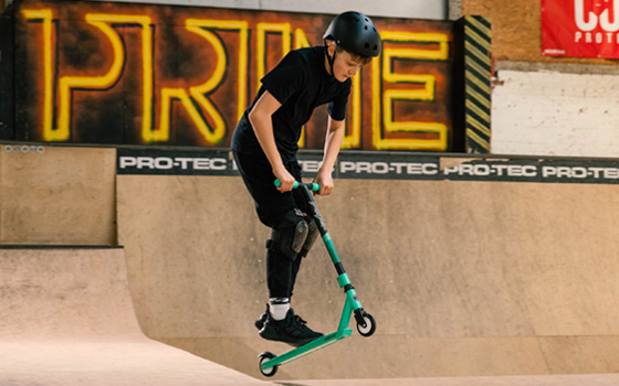 Teenager on a stunt scooter