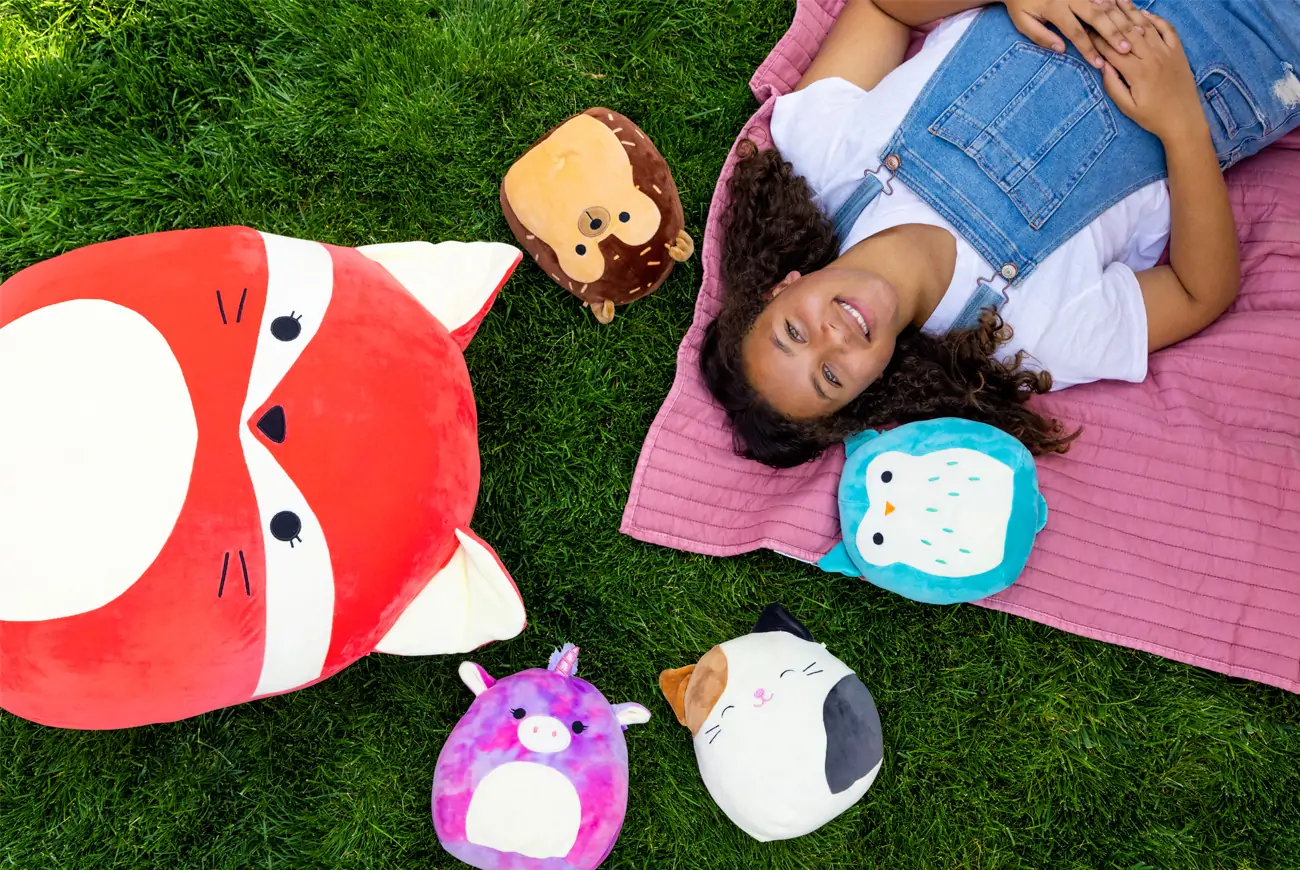 Girl with Squishmallows.