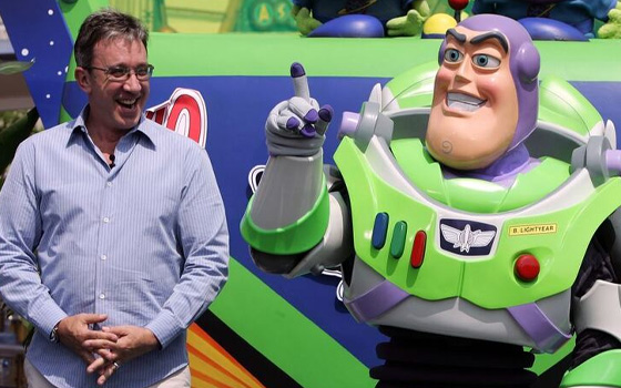 Tim Allen with the character Buzz Lightyear who he voices