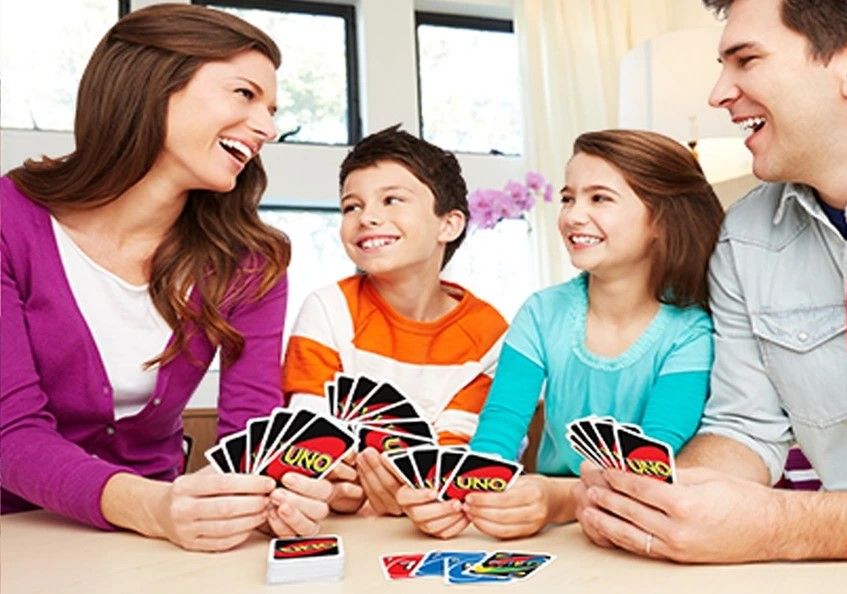 Family playing UNO.