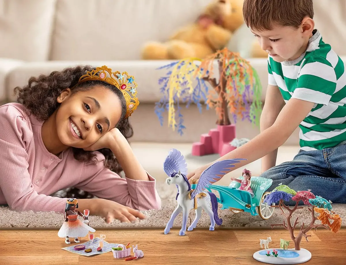 Children play with Playmobil toys.