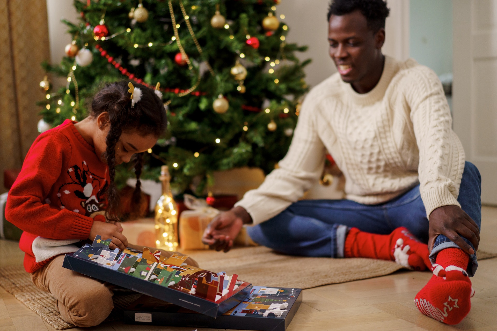 Kid with advent calendar.
