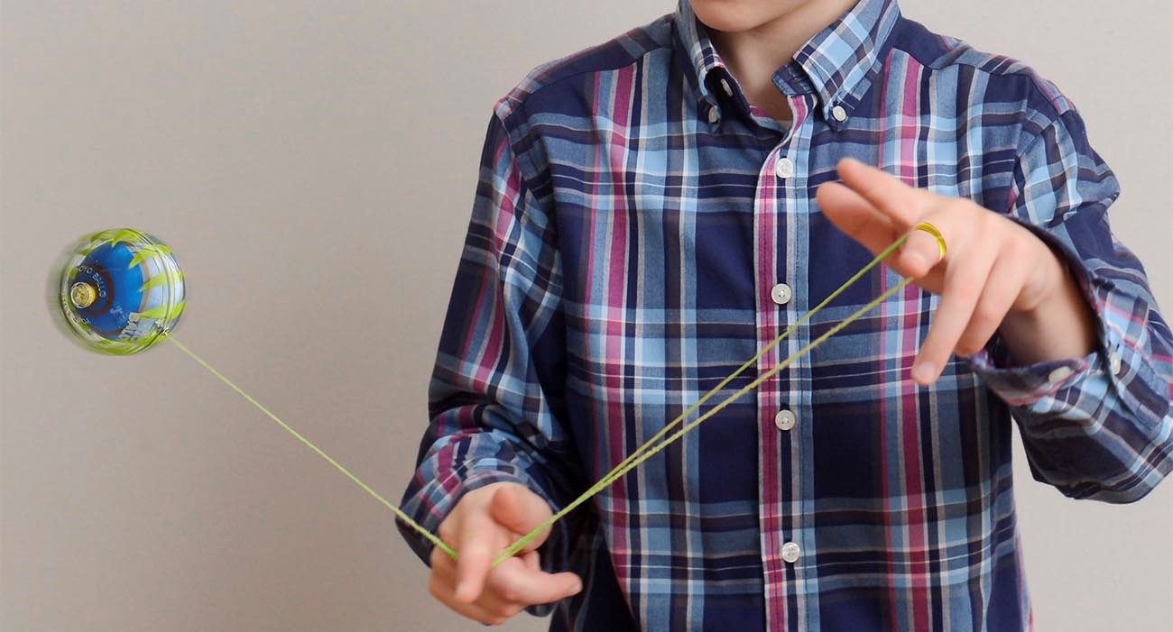 Boy plays with YOYO.