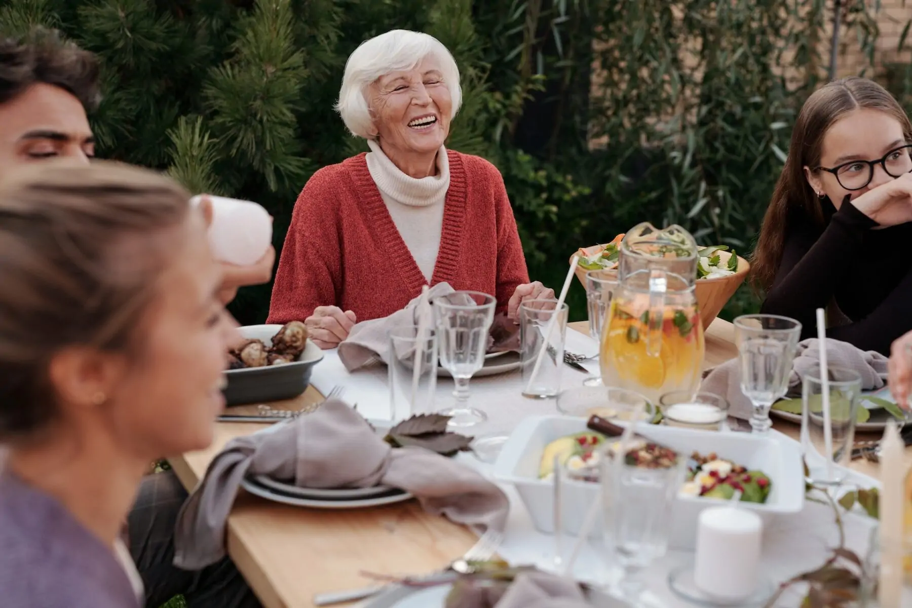 Family eat in garden