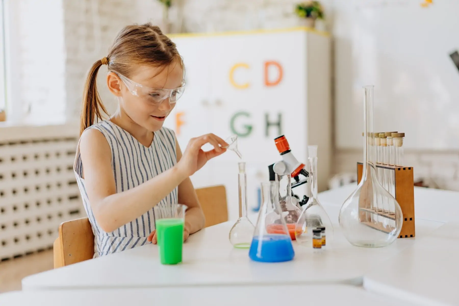 Girl doing science