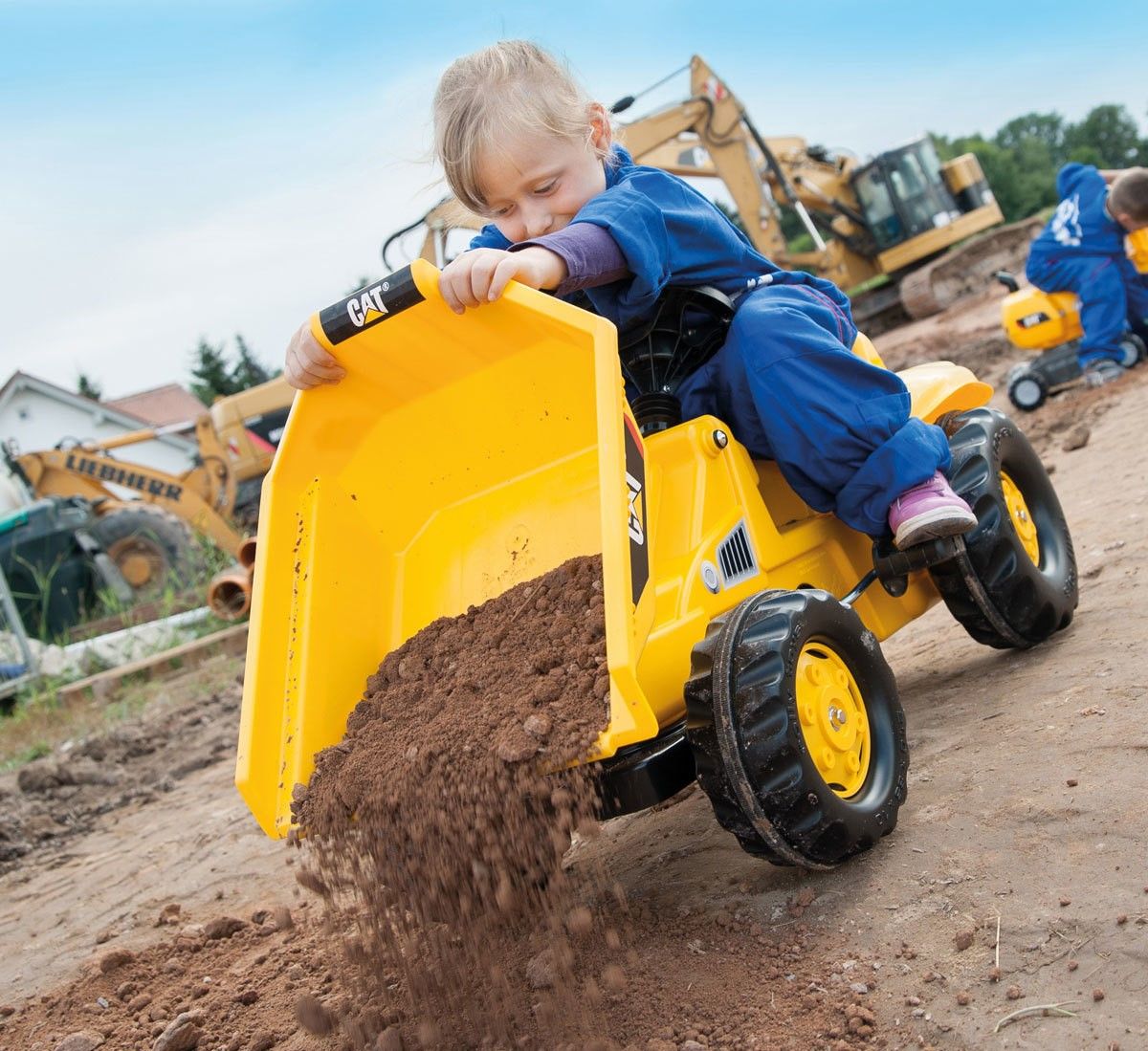 Bright yellow ride-on tractor for children.