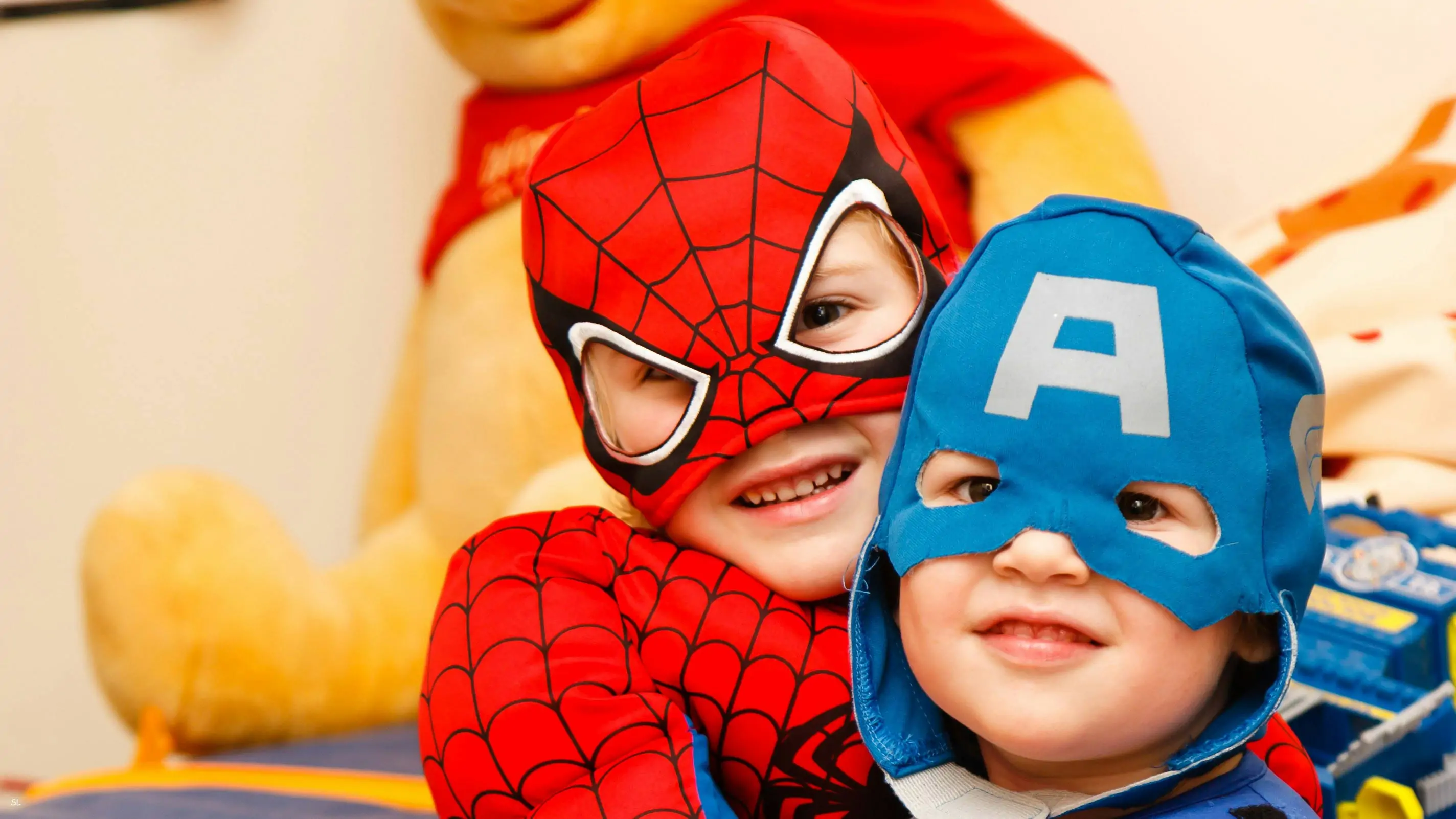 children dressing up as superheroes