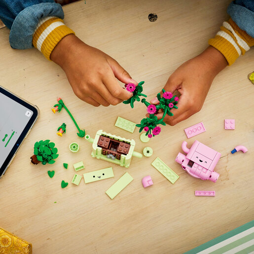 Child building a LEGO set action view