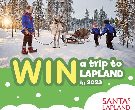 Lifestyle image of people with reindeer and sleigh. Graphic saying Win a trip to Lapland in 2023 with Santa's Lapland.
